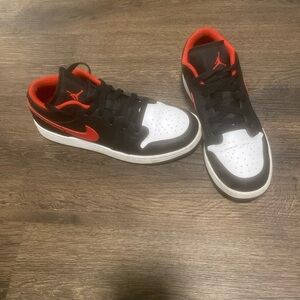 Red, black, and white air Jordan’s kids 5.5